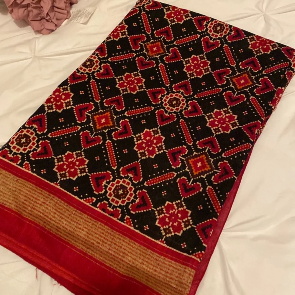Black and dark red saree